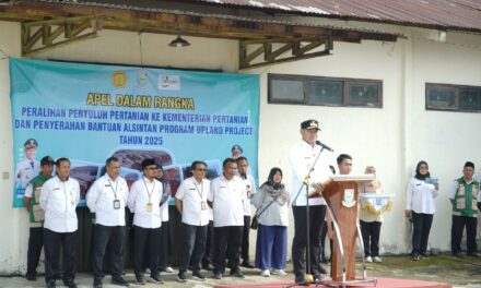 Bupati Fahmi Pimpin Apel Peralihan 149 ASN Penyuluh dan Serahkan 646 Unit Alsintan